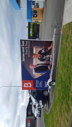 DESIGNA-SIGN-PROMOTIONAL-TRAILER-SIDE-VIEW